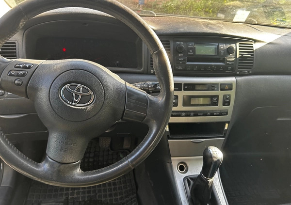 Toyota Corolla cena 11000 przebieg: 209427, rok produkcji 2004 z Poznań małe 137